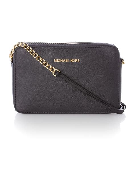 michael kors jet set travel small black cross body bag|Michael Kors jet set collection.